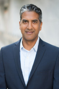 headshot of Iyanrick John